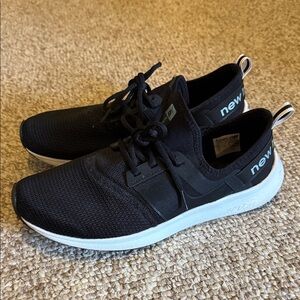 New Balance womens Black and White Sneakers